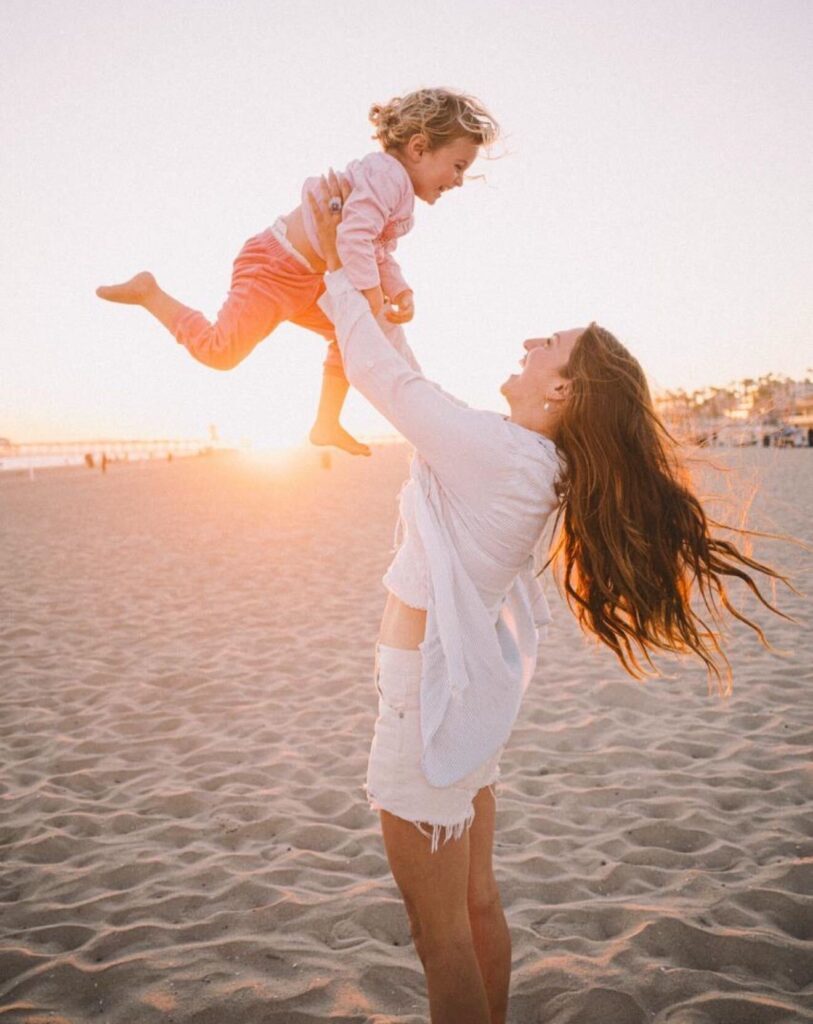 Maria Wendt on the beach with her daughter, just one of the moments her online business has been able to create.